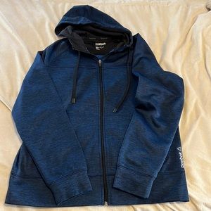 Blue Reebok zip up hoodie. Size Medium